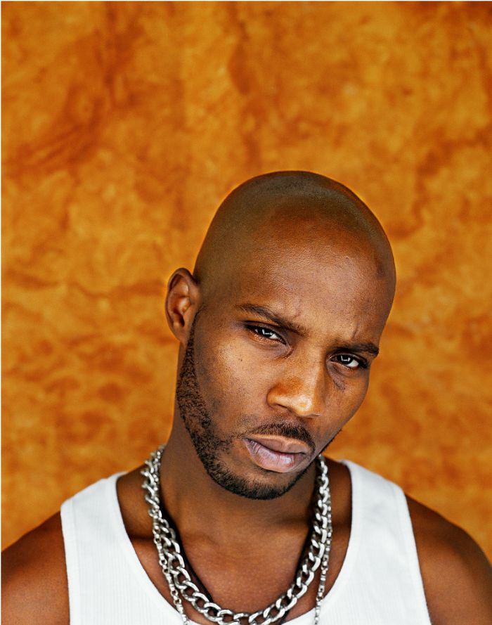 Portrait of DMX in a white tank top, with a heavy silver chain